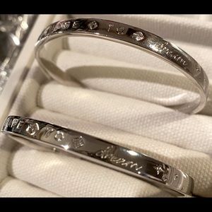 Dare to Dream bracelet, one size fits most.  Silver with two CZ stones.